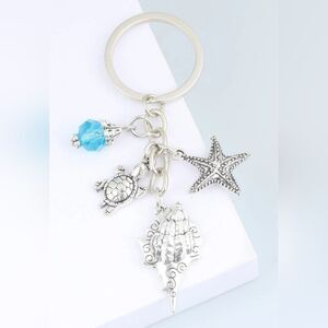 Keychain star fish turtle shell silver